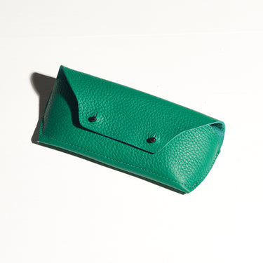 green turquoise lether glasses holder made by hand in portland maine